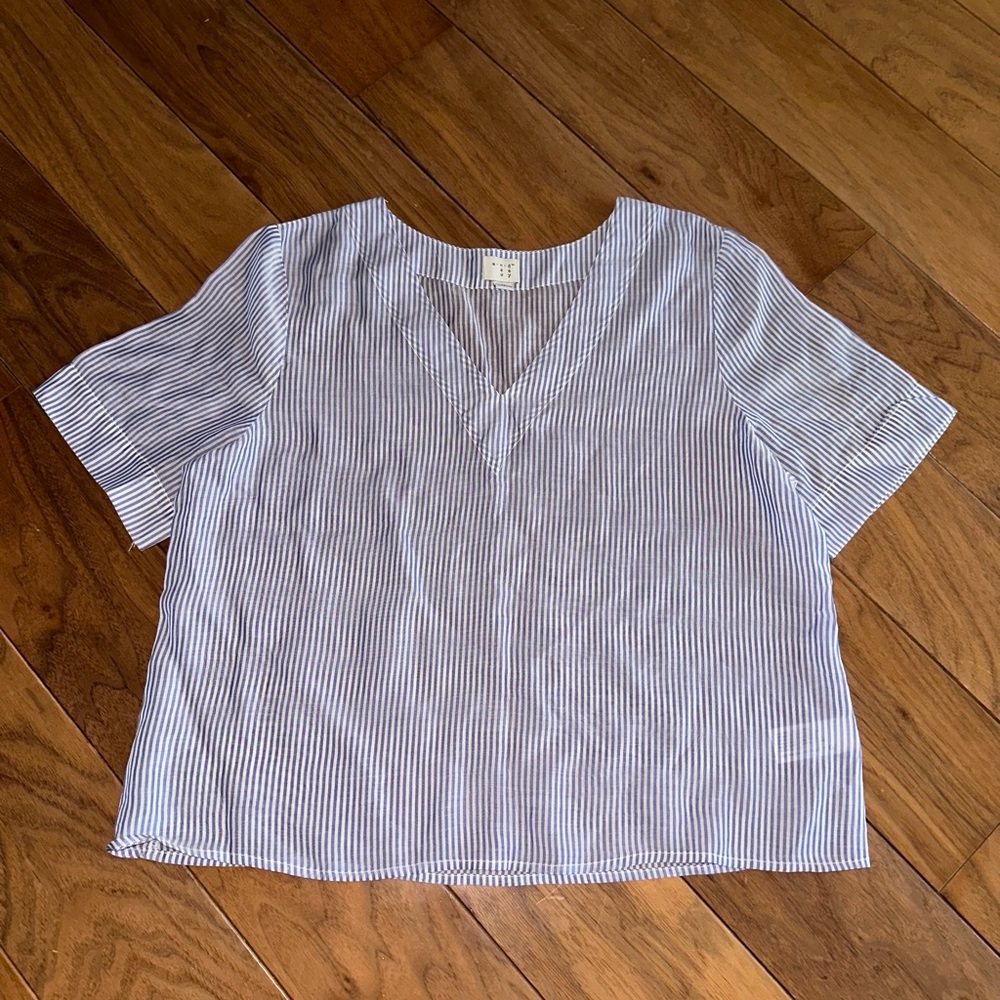A New Day shirt.